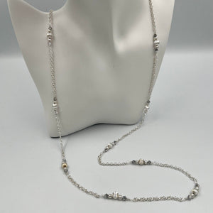 Adjustable (33-36 inches) silver plated beaded chain necklace made by The Jewelry Pad.